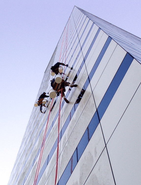 Technicians rappelling from the roof of The Ralph D. Turlington Florida Education Center in Tallahassee, FL