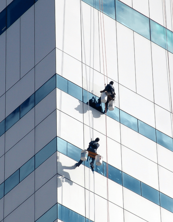 Presto technicians perform metal and glass restoration on facade of the Turlington Building in Tallahassee, FL