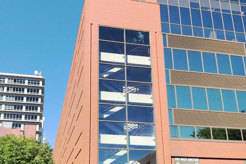 Caulking glass to brick joints, brick to metal joints, and wet glazing windows is part of commercial building waterproofing services