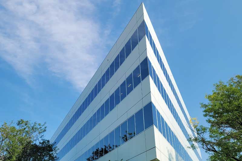 Colorado office building after metal panel and glass restoration services